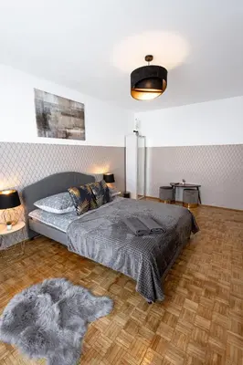 Łóżko lub łóżka w pokoju w obiekcie ClickTheFlat Norblin Factory Apart Rooms