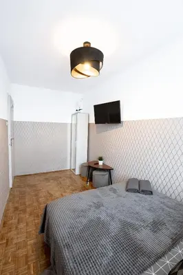 Łóżko lub łóżka w pokoju w obiekcie ClickTheFlat Norblin Factory Apart Rooms