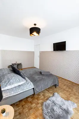 Łóżko lub łóżka w pokoju w obiekcie ClickTheFlat Norblin Factory Apart Rooms