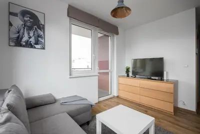 Telewizja i/lub zestaw kina domowego w obiekcie Arte Praga Koneser Apartment by BookingHost