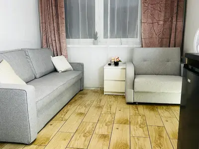 Część wypoczynkowa w obiekcie Klimatyczna kawalerka typu studio na Mokotowie blisko centrum