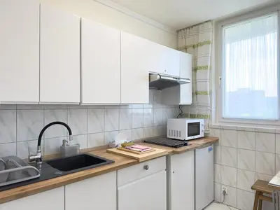 Kuchnia lub aneks kuchenny w obiekcie Apartament Bazyliańska - 100m do Metra 
