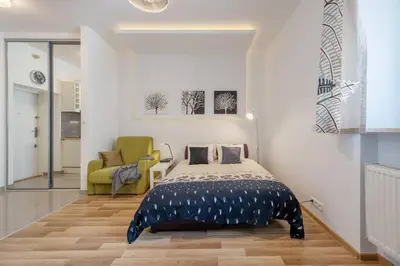 Łóżko lub łóżka w pokoju w obiekcie Fantastica Warszawa#Cozy Flat#CityCenter#Smart aTV#Fast WiFi