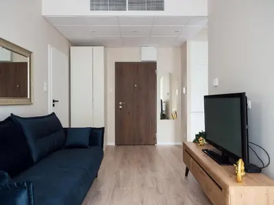 Telewizja i/lub zestaw kina domowego w obiekcie Perfect Apart Kasprzaka 29 Wola Tower