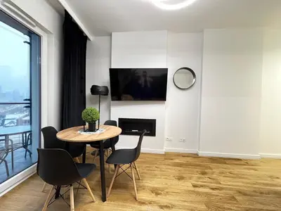 Telewizja i/lub zestaw kina domowego w obiekcie Perfect Apart Kasprzaka 29 Wola Tower