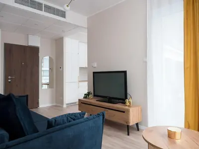 Telewizja i/lub zestaw kina domowego w obiekcie Perfect Apart Kasprzaka 29 Wola Tower