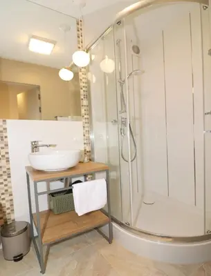 Łazienka w obiekcie Falcon Apartment Center 3 Królewska