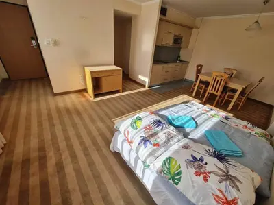 Łóżko lub łóżka w pokoju w obiekcie 10Q - Z6 Apartment 501
