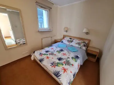Łóżko lub łóżka w pokoju w obiekcie 10Q - Z6 Apartment 505