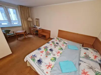 Łóżko lub łóżka w pokoju w obiekcie 10Q - Z6 Apartment 506