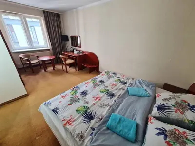 Łóżko lub łóżka w pokoju w obiekcie 10Q - Z6 Apartment 406
