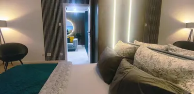 Łóżko lub łóżka w pokoju w obiekcie Nowa Grochowska