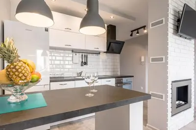 Kuchnia lub aneks kuchenny w obiekcie Vorto Apartament 2 - Warszawa Centrum