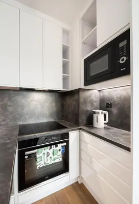 Kuchnia lub aneks kuchenny w obiekcie Żupnicza Green Praga Apartment by BookingHost