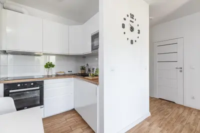 Kuchnia lub aneks kuchenny w obiekcie SuperApart Budowlana 5 - Nowoczesny Apartament