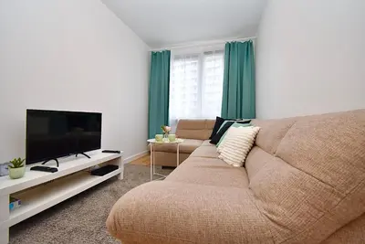 Telewizja i/lub zestaw kina domowego w obiekcie Rental Apartment Obrzeżna