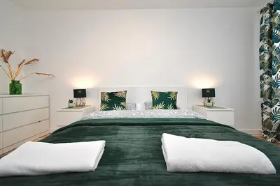 Łóżko lub łóżka w pokoju w obiekcie Rental Apartment Obrzeżna